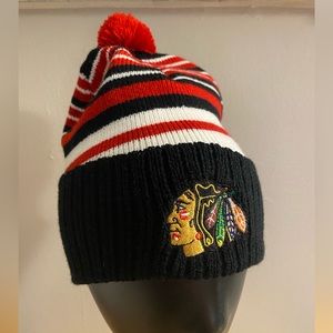 SGA Chicago Blackhawks einter knit striped pom hat. New in plastic.